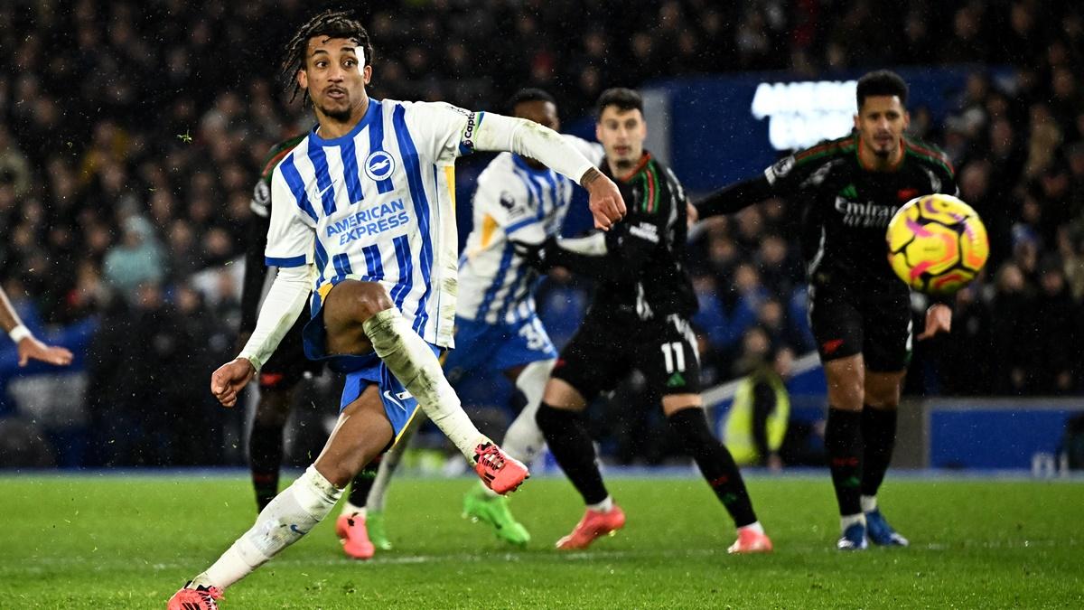 Joao Pedro scores from the penalty spot to earn Brighton & Hove Albion a draw against Arsenal at The American Express Community Stadium, Brighton.