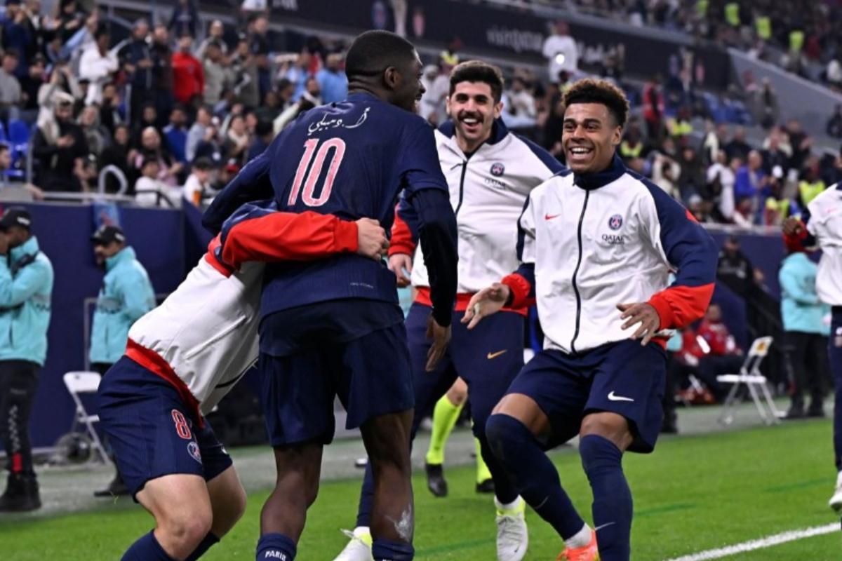 PSG players celebrate after Dembele scored the winning goal