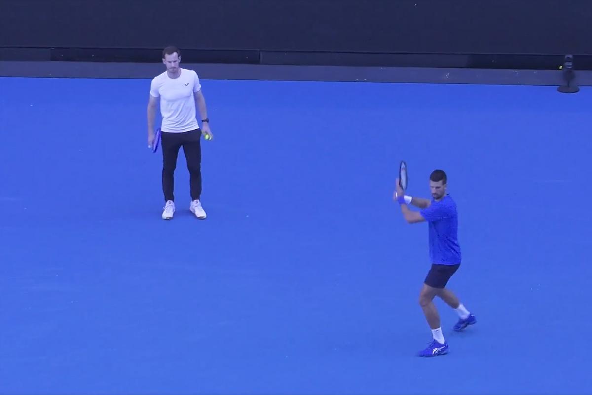 Coach Andy Murray watches as Novak Djokovic hits some balls in practice on Wednesday, January 7