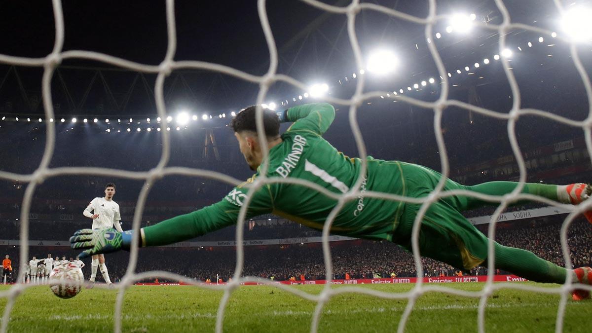 Manchester United goalkeeper Altay Bayindir saves the penalty