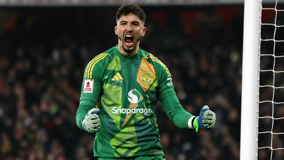 Manchester United goalkeeper Altay Bayindir celebrates