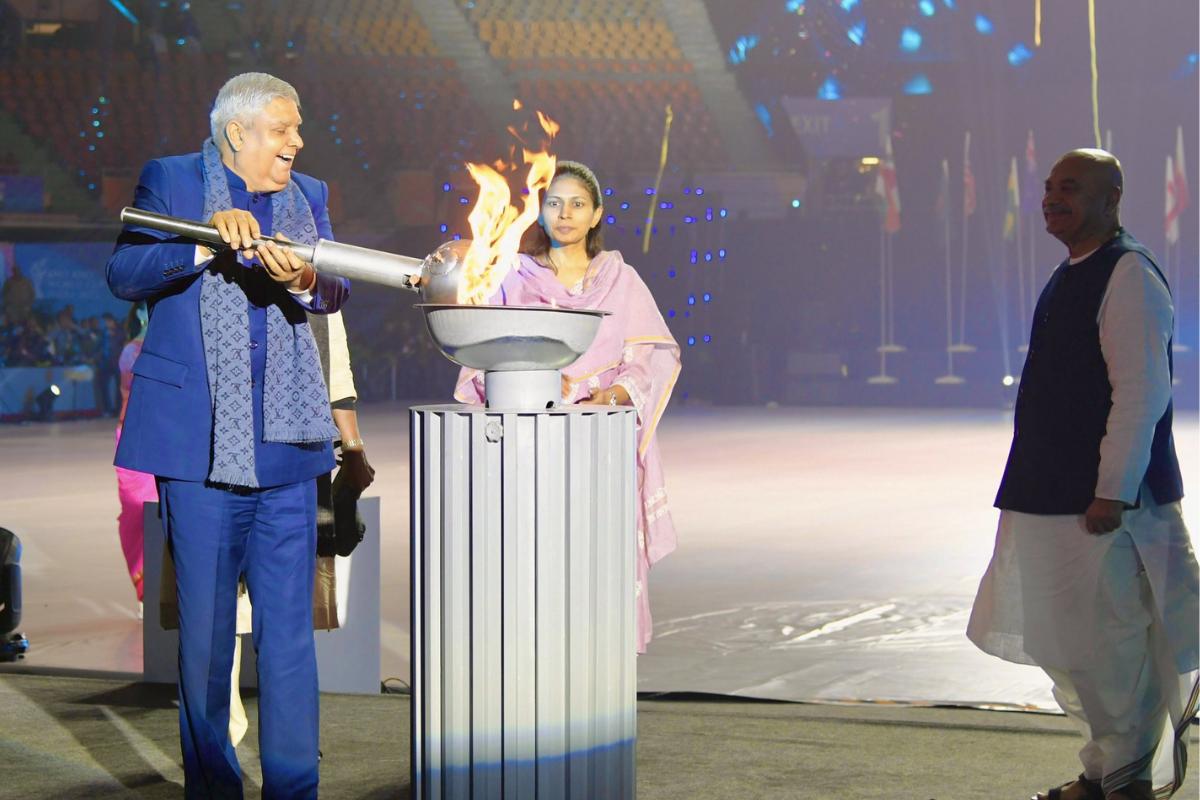 Vice President of India Jagdeep Dhankhar lights the cauldron to announce the opening of the showpiece event.