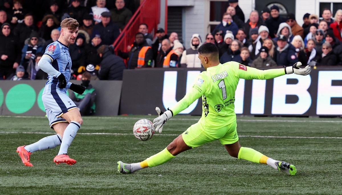 Tottenham Hotspur's Timo Werner has his shot save