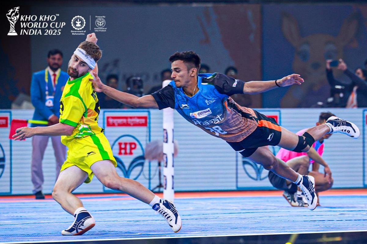 India's Ramji Kashyap goes flying as he attempts a touch during the Kho Kho World Cup match against Brazil in New Delhi on Tuesday