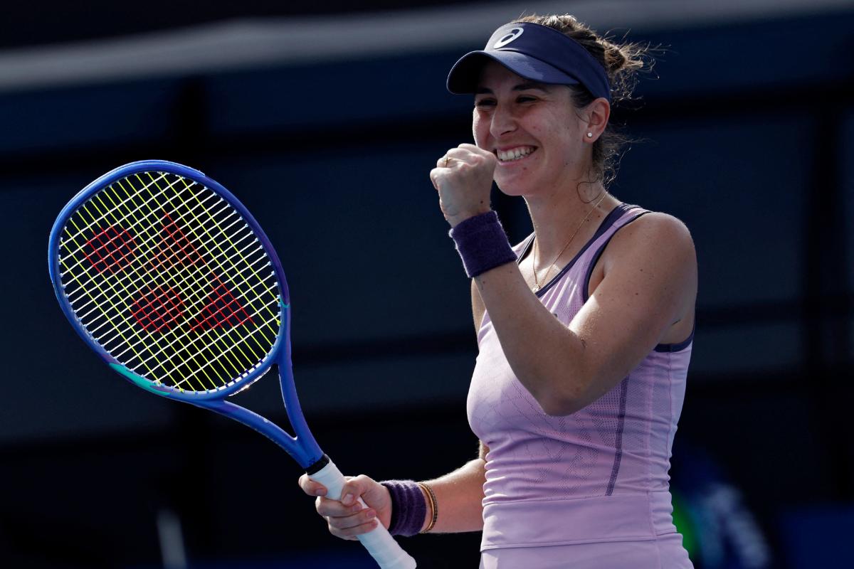 Switzerland's Belinda Bencic celebrates after winning her first round match against Latvia's Jelena Ostapenko