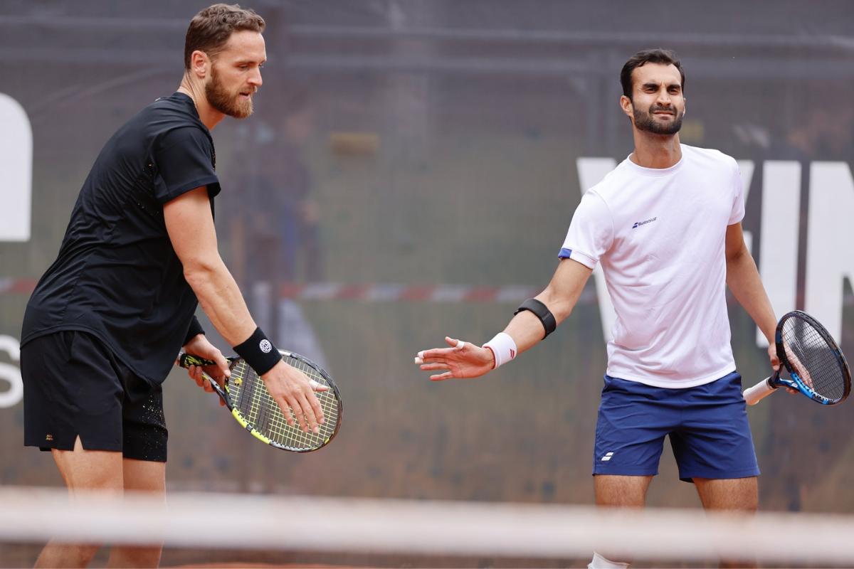 Yuki Bhambri and Albano Olivetti were kocked out of the opening round of the Australian Open men's doubles match in Melbourne, on Wednesday