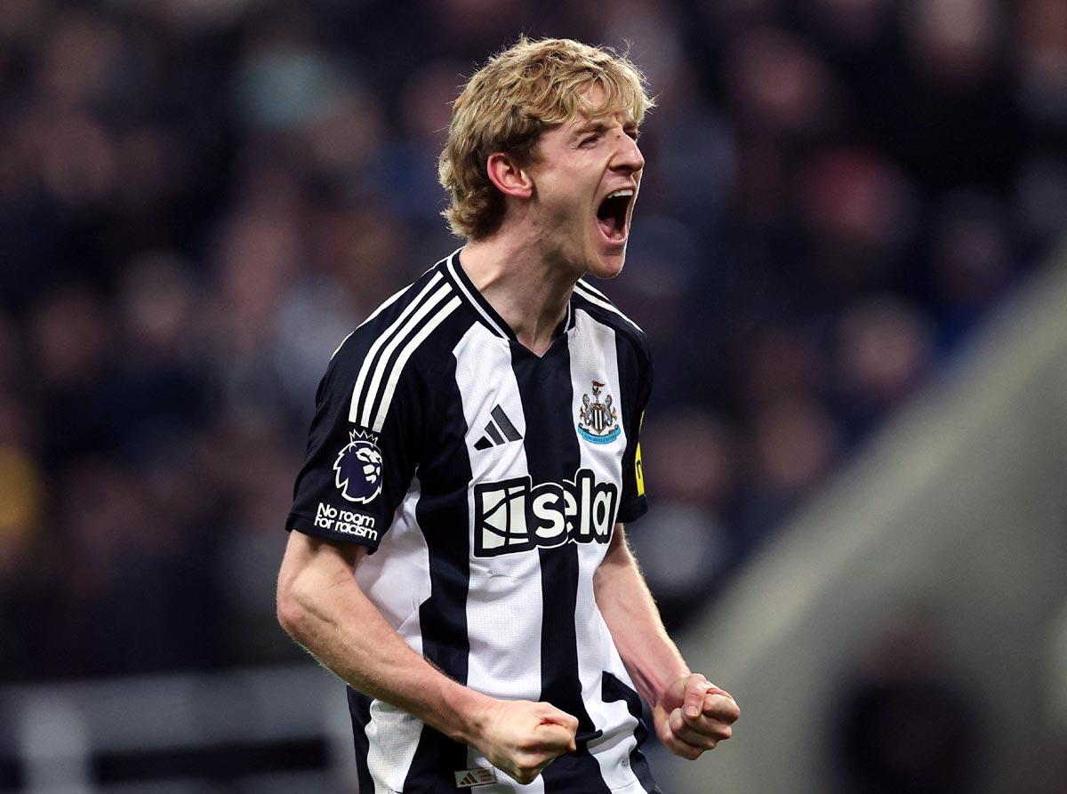 Anthony Gordon celebrates scoring Newcastle United's third goal