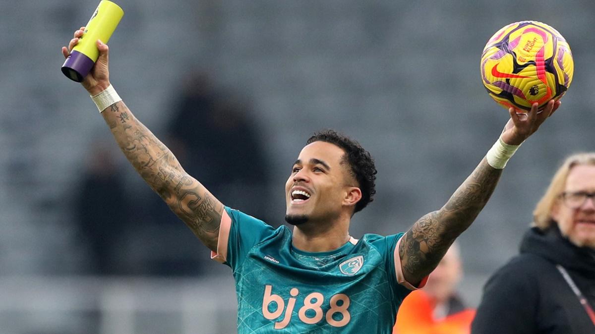 Justin Kluivert celebrates with the match ball and player of the match trophy after Bournemouth's big win over Newcastle United at St James' Park, Newcastle, on Saturday.