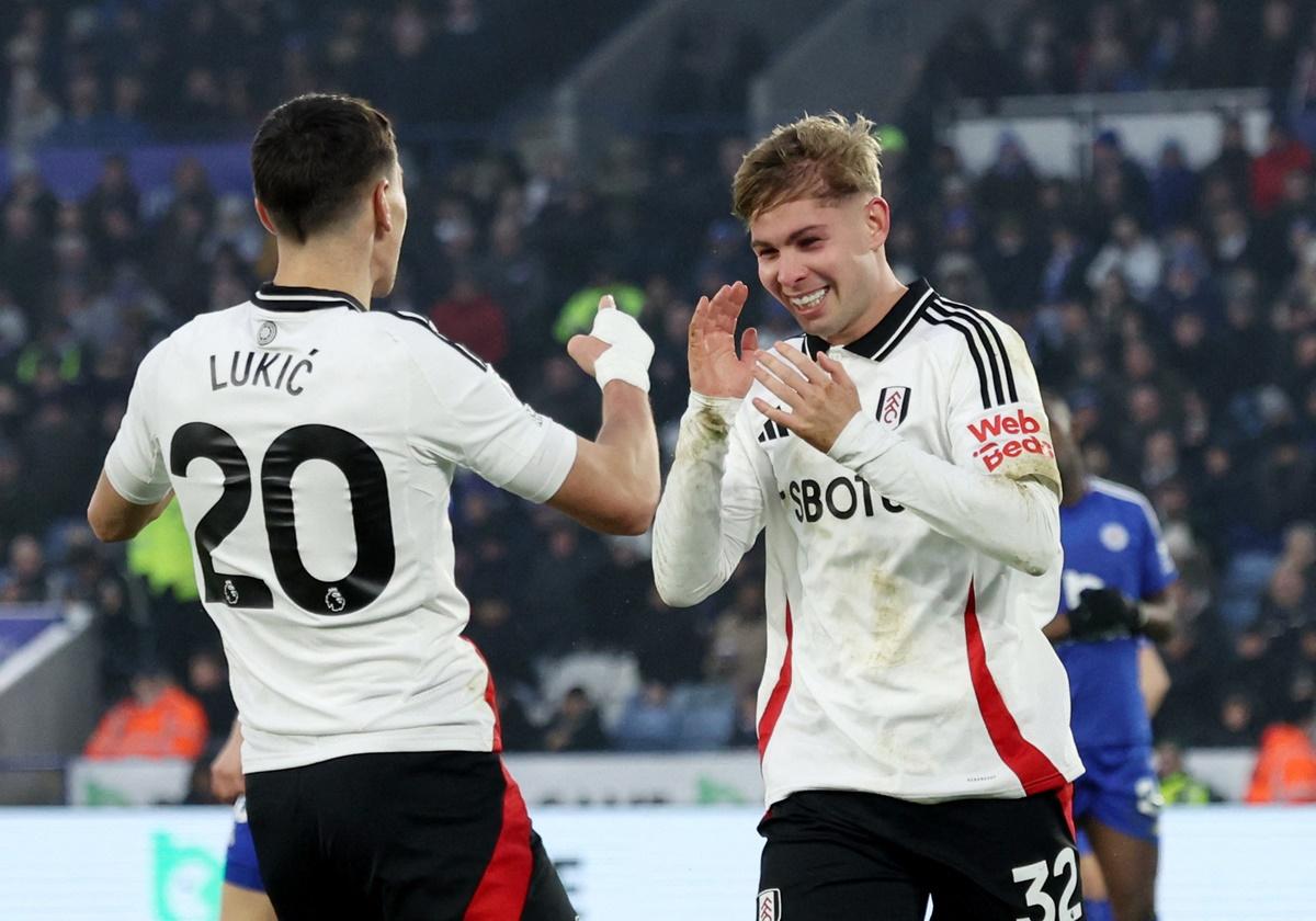 Emile Smith Rowe celebrates scoring Fulham's first goal with Sasa Lukic against Leicester City at King Power Stadium, Leicester.