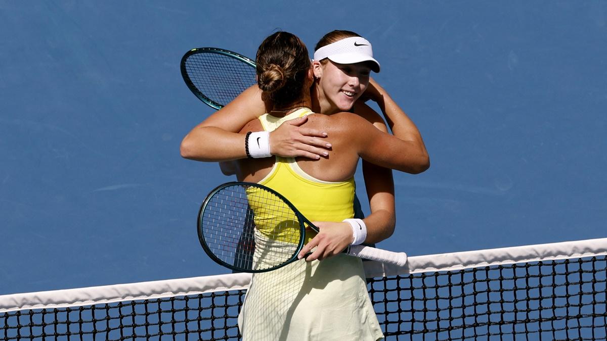 Aryna Sabalenka embraces Mirra Andreeva after the match.