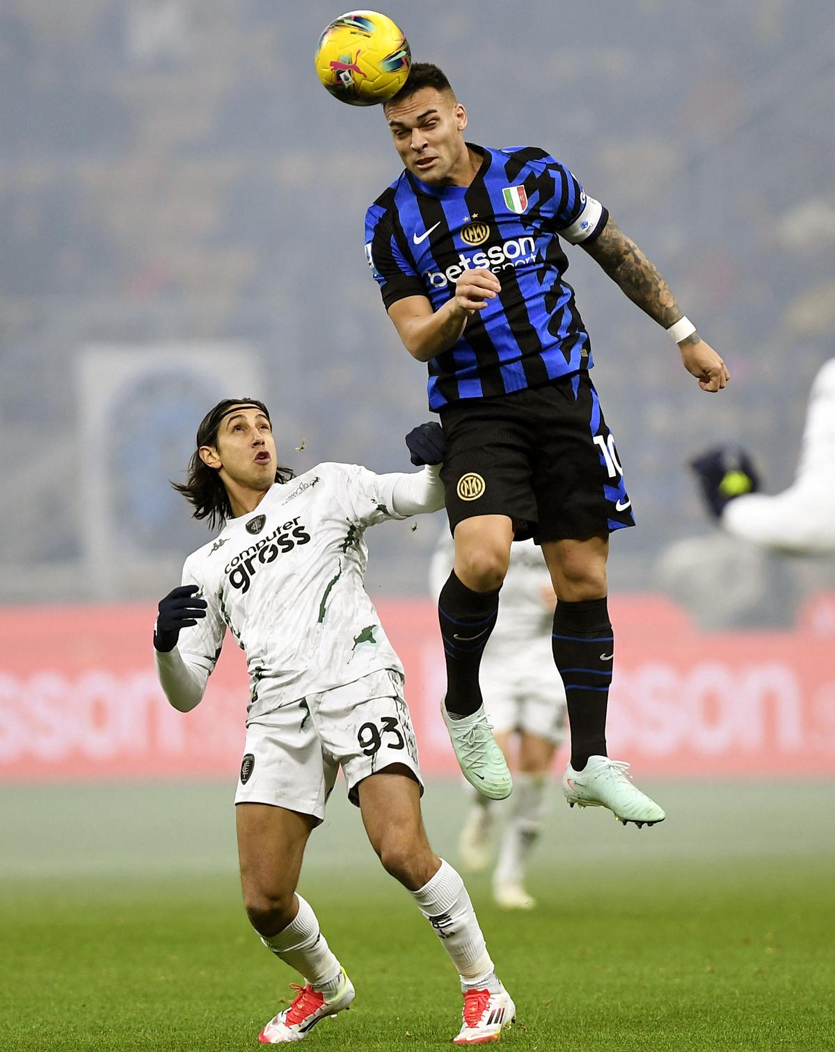 Inter Milan's Lautaro Martinez heads the ball