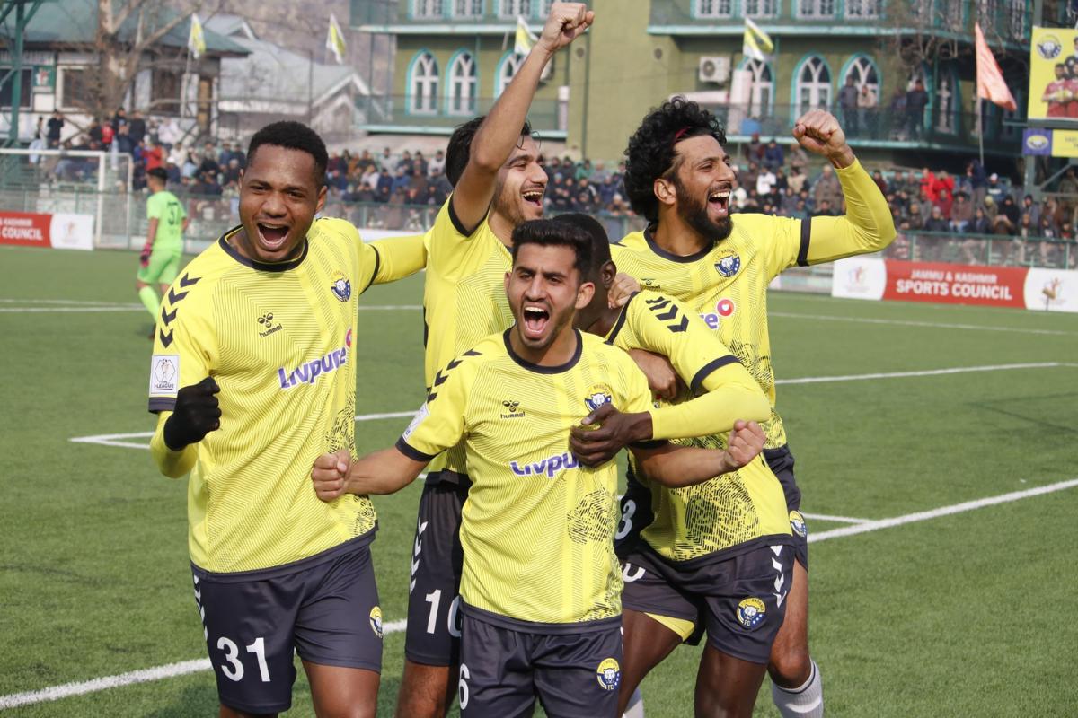 Real Kashmir players celebrate a goal