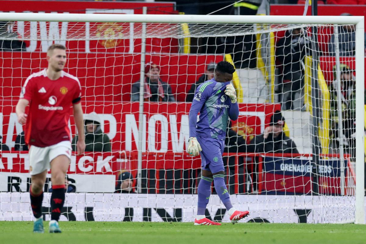 Manchester United's Andre Onana looks dejected after Brighton & Hove Albion's Georginio Rutter scores their third goal