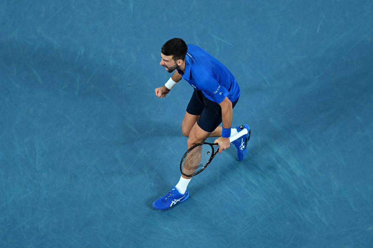 Serbia's Novak Djokovic celebrates after winning his quarter final match against Spain's Carlos Alcaraz 