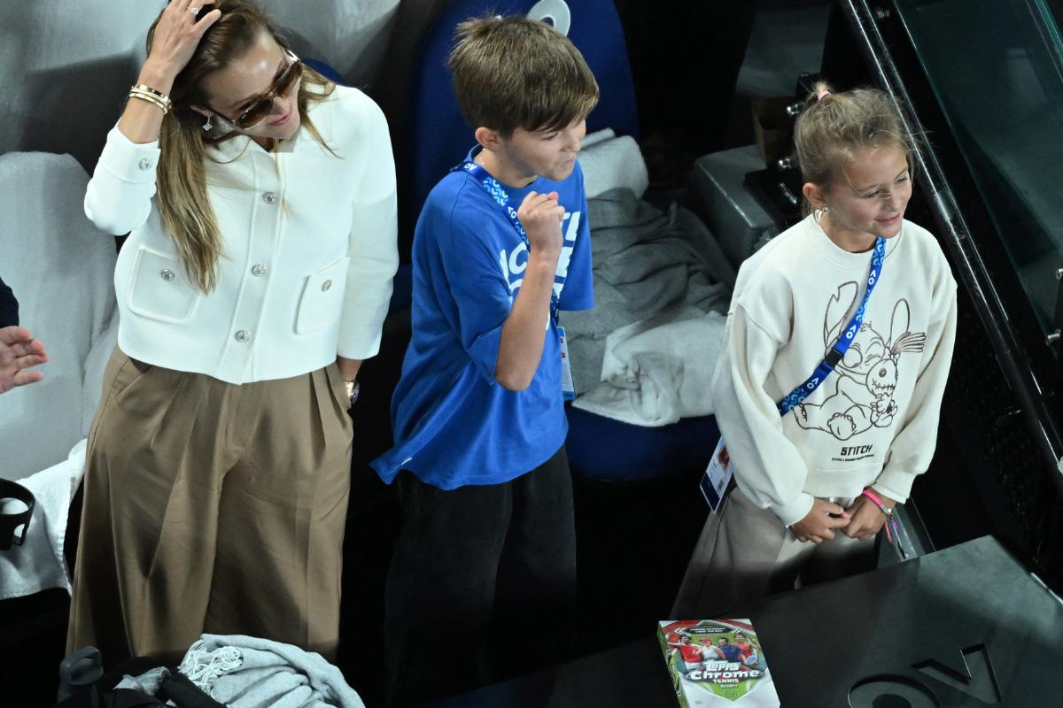 Novak Djokovic's wife Jelena and children Stefan and Tara celebrate after his win