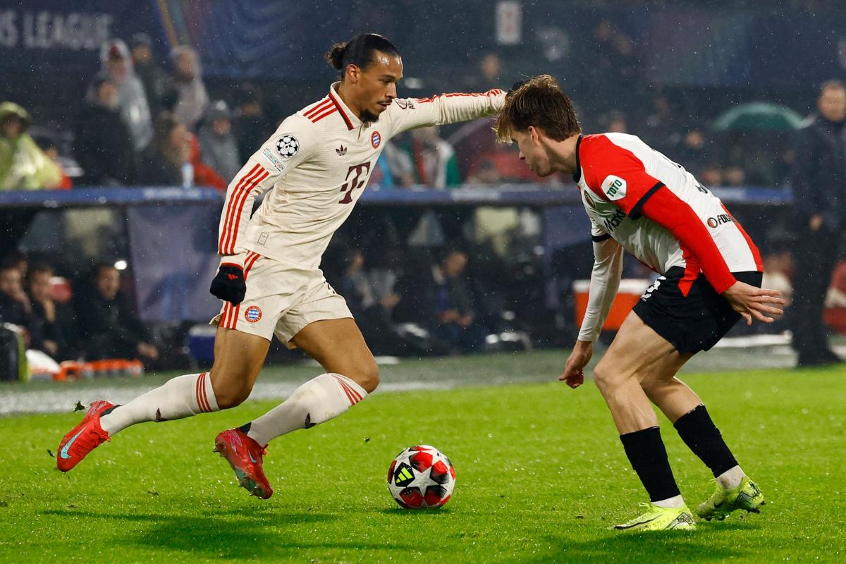 Bayern Munich's Leroy Sane in action with Feyenoord's Gijs Smal 