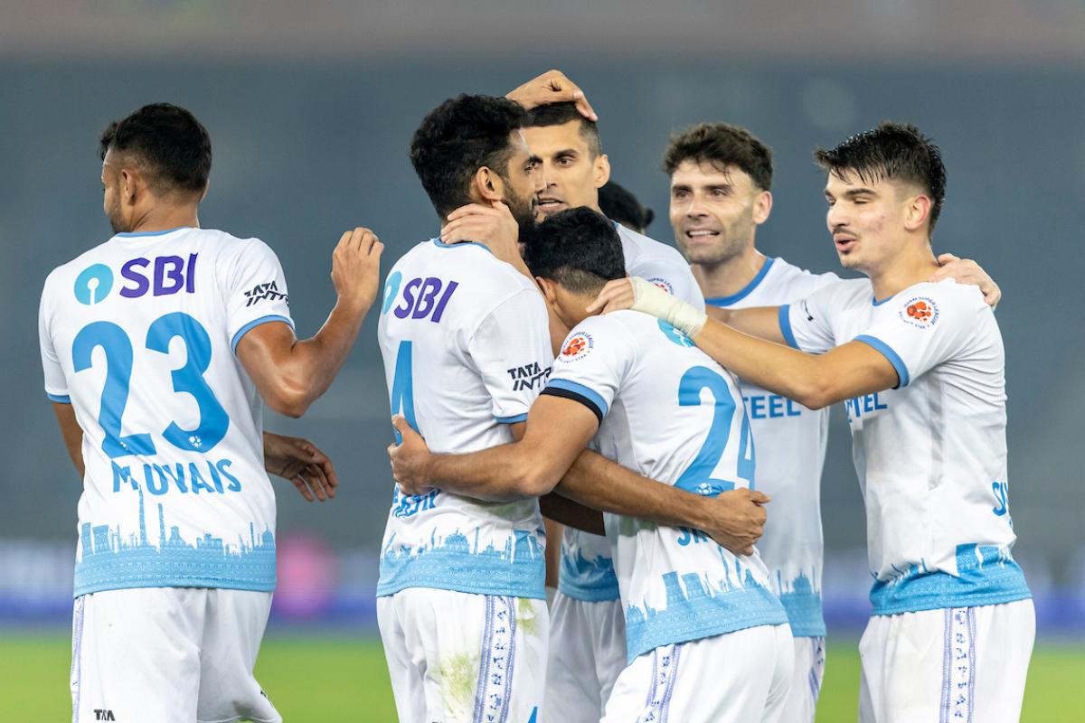 Jamshedpur FC's players celebrate a goal against Punjab FC during their ISL match in New Delhi on Tuesday