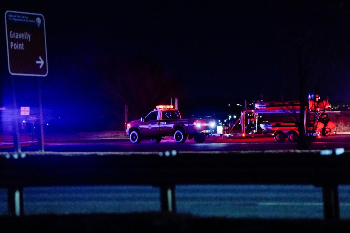 Emergency vehicles leave Gravelly Point, after American Eagle flight 5342 collided with a helicopter while approaching Reagan Washington National Airport and crashed in the Potomac River, in Arlington, Virginia, US on January 29, 2025