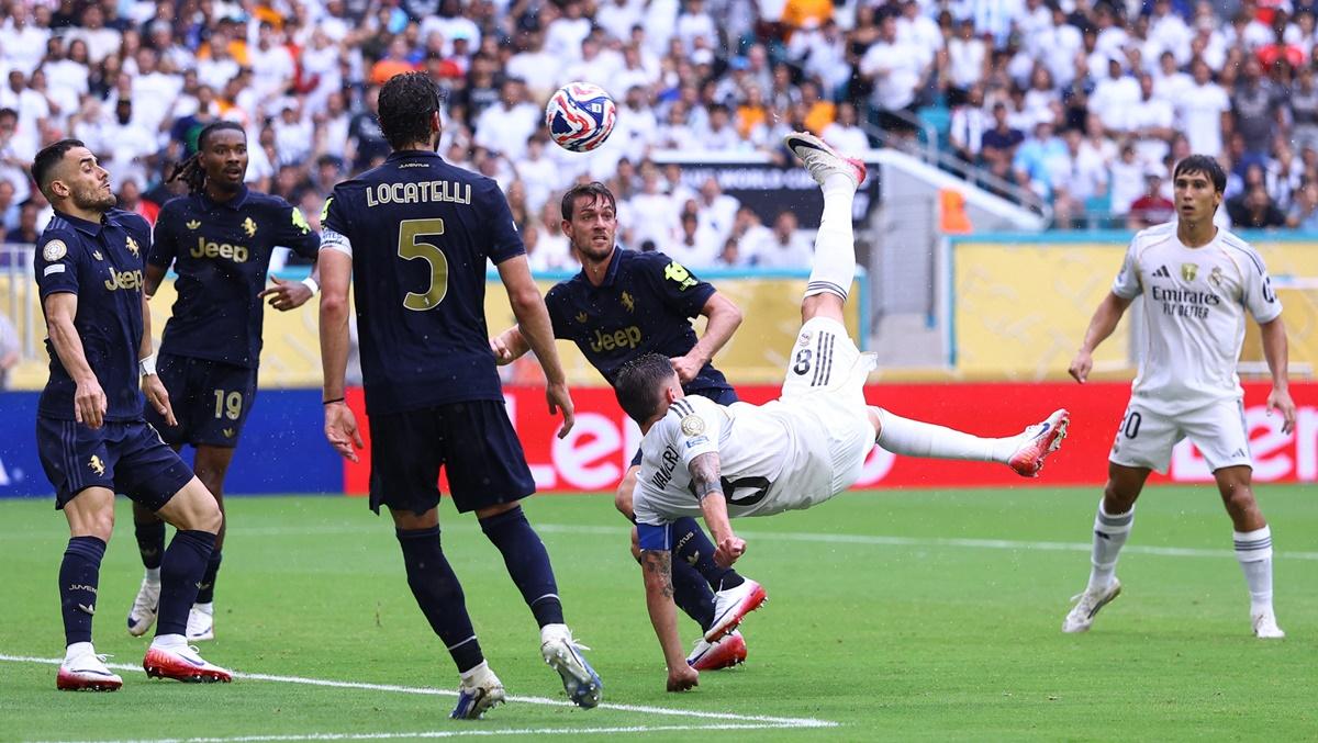 Real Madrid's Federico Valverde shoots at goal with an overhead kick.