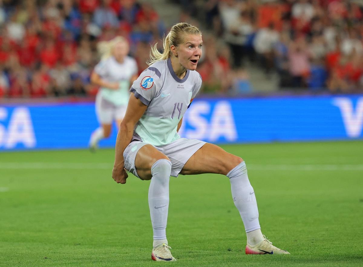 Katariina Kosola celebrates after Switzerland's Julia Stierli turns a low cross from Caroline Graham Hansen into the her own net.