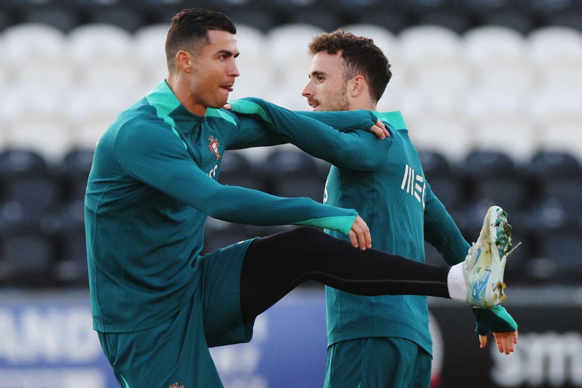 Portugal's Cristiano Ronaldo and Diogo Jota during training at The SMISA Stadium, Paisley, Scotland, Britain, October 14, 2024