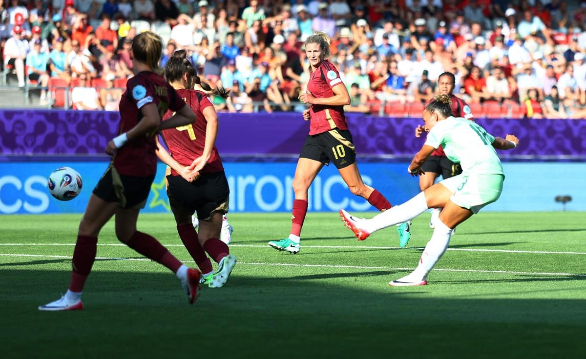 Arianna Caruso scores for Italy in the Group B match against Belgium at Stade de Tourbillon, Sion, Switzerland.