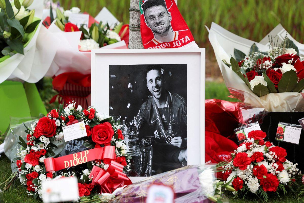 Flower tributes are left outside Liverpool's Anfield Stadium, paying tribute to Diogo Jota