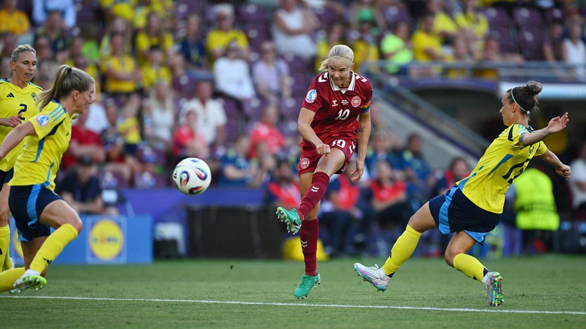 Denmark's Pernille Harder shoots at the Sweden goal.