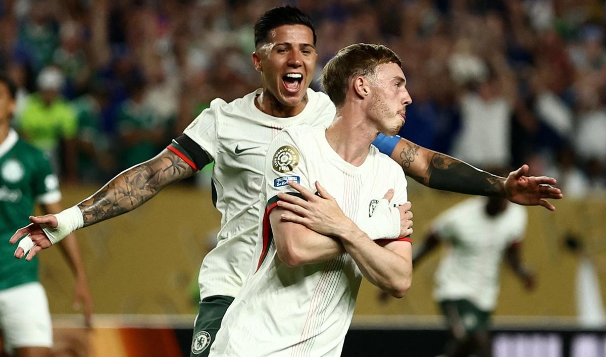 Cole Palmer celebrates with Enzo Fernandez after scoring.
