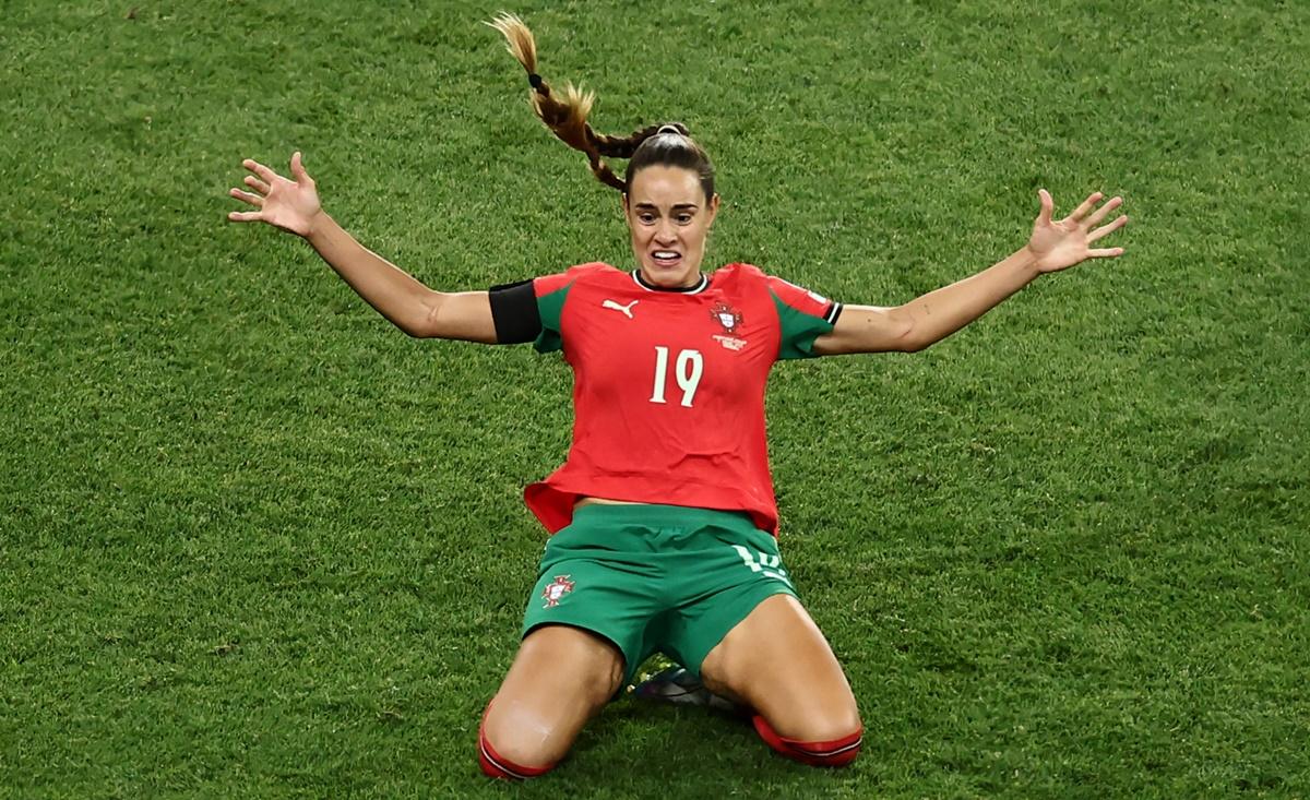 Diana Gomes celebrates scoring for Portugal late in the Women's Euros Group B match against Italy at Stade de Geneve, Geneva.