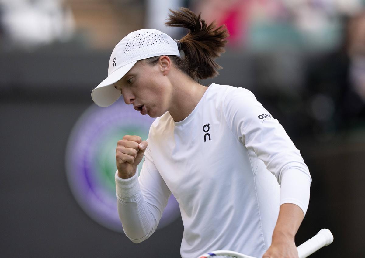  Poland's Iga Swiatek reacts after winning a point against Denmark's Clara Tauson.