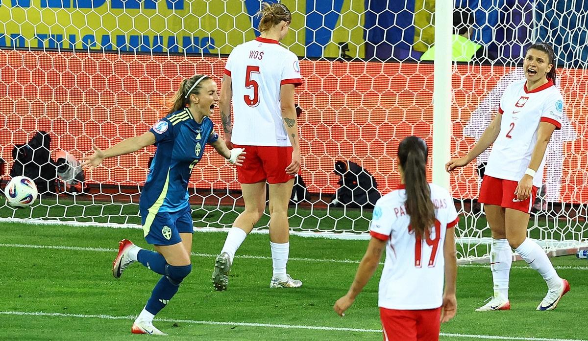 Kosovare Asllani celebrates scoring Sweden's second goal.