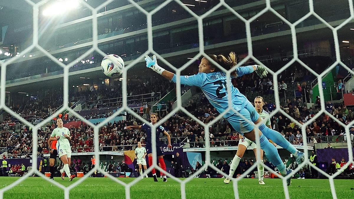 Amel Majri scores France's third goal past Wales goalkeeper Safia Middleton-Patel.