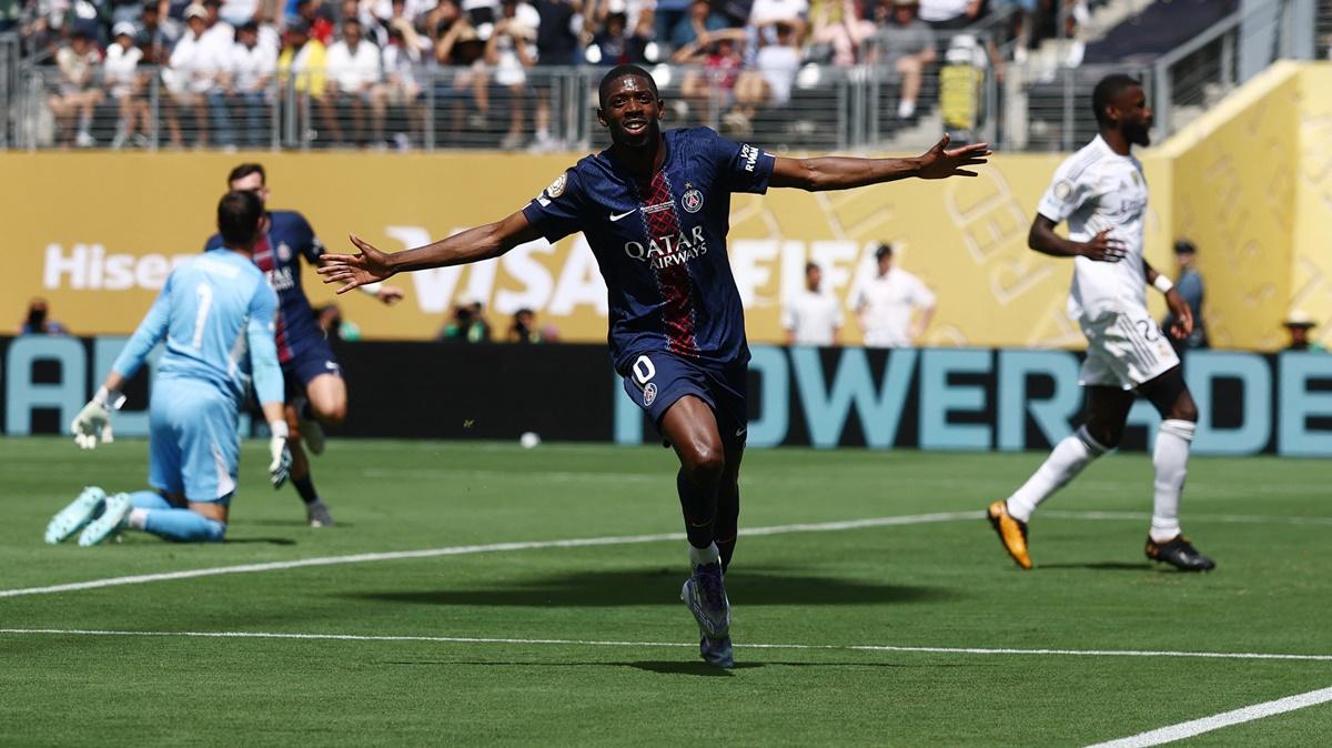 Ousmane Dembele celebrates scoring Paris St Germain's second goal.