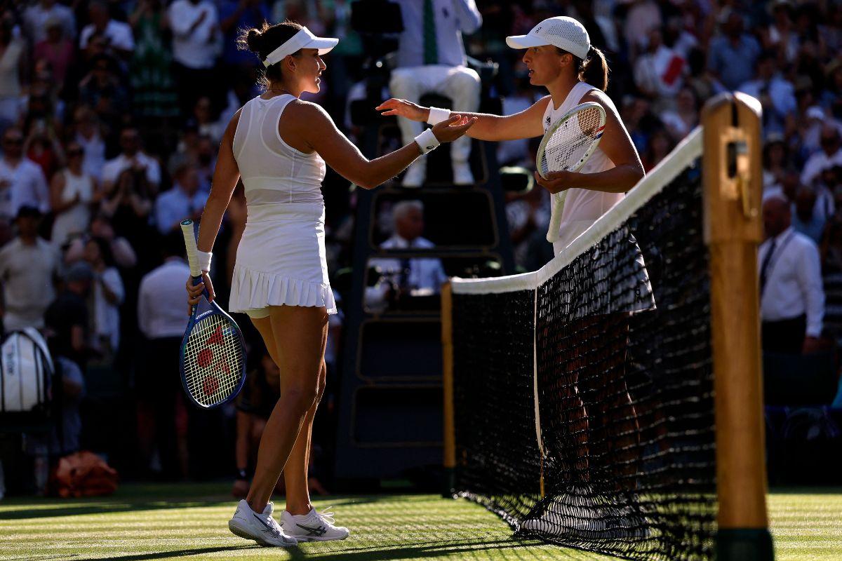 Poland's Iga Swiatek is congratulated by Switzerland's Belinda Bencic after winning their semi-final match