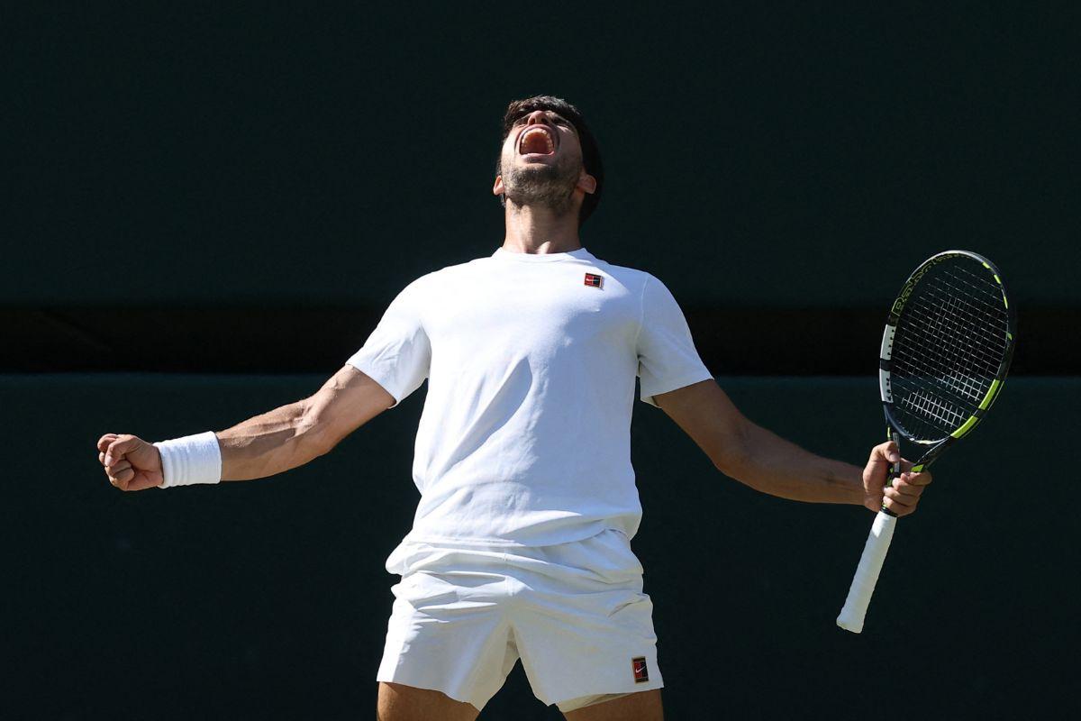 Spain's Carlos Alcaraz celebrates after winning his Wimbledon semi-final match against Taylor Fritz of the US at the  All England Lawn Tennis and Croquet Club, London, Britain, on Friday 