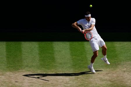 USA's Taylor Fritz in action during his semi-final match against Spain's Carlos Alcaraz