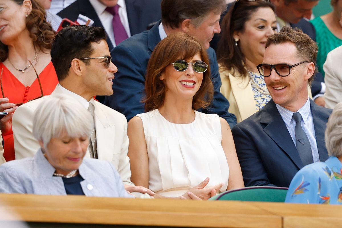 Actor Rami Malek (left) talks with fellow British actor Benedict Cumberbatch (right) and theatre director Sophie Hunter in the Royal Box