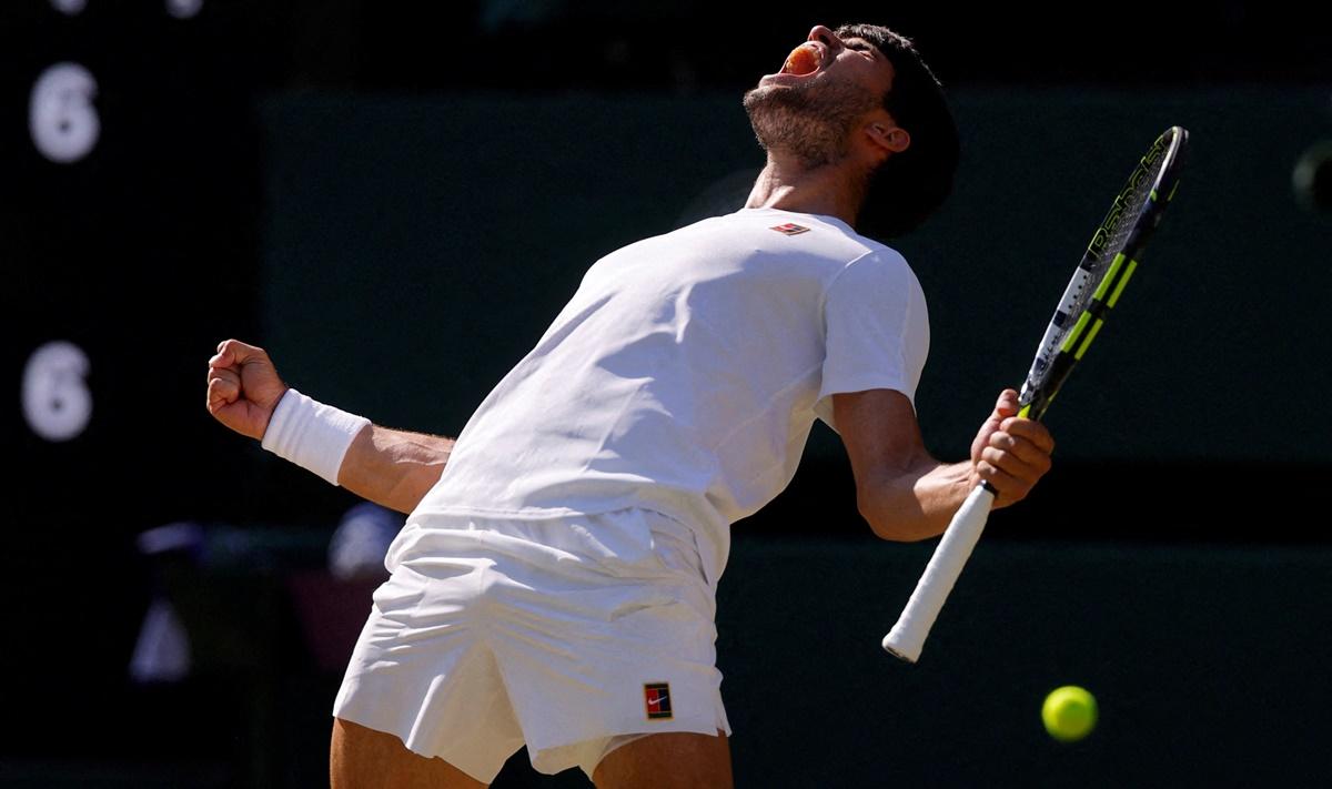 Spain's Carlos Alcaraz celebrates victory over Taylor Fritz of the United States.