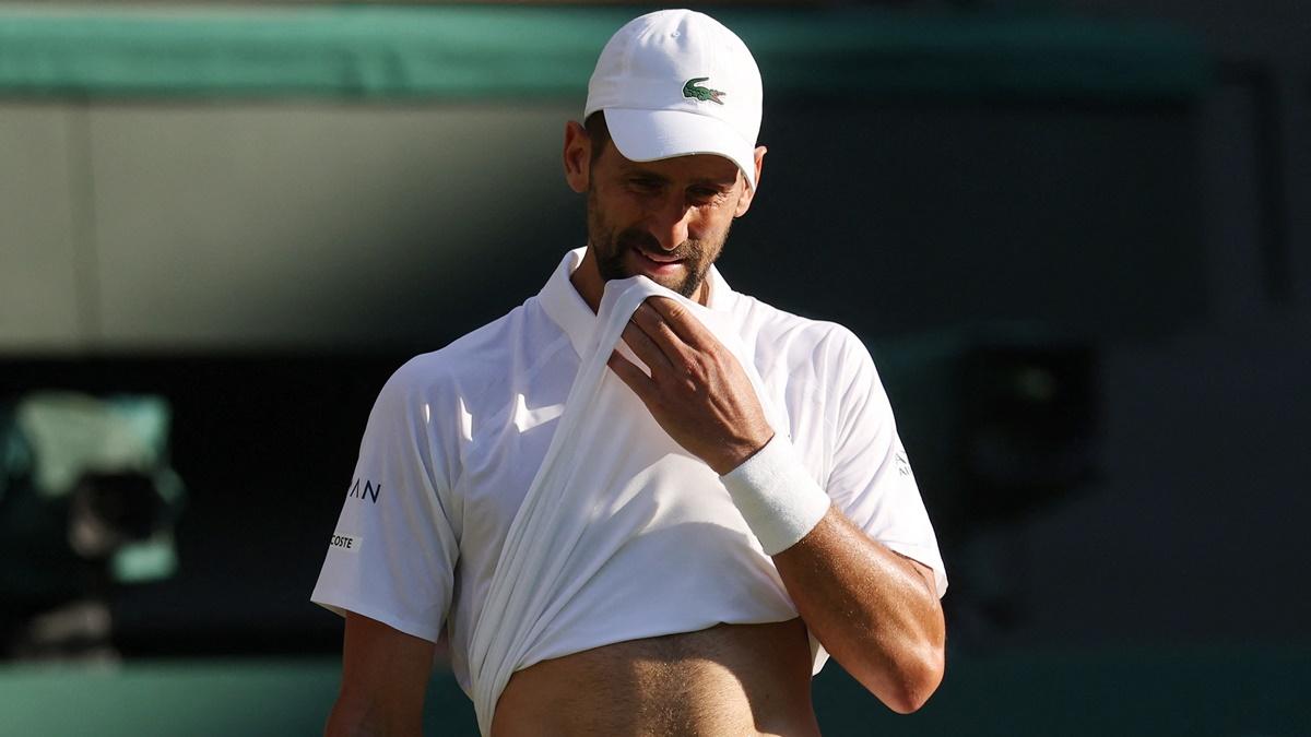Novak Djokovic reacts after losing a point during his Wimbledon semi-final against Italy's Jannik Sinner at the All England Lawn Tennis and Croquet Club, London, on Friday.
