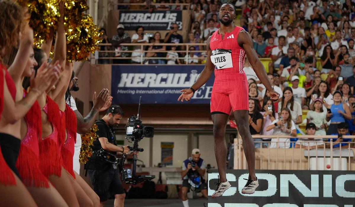 Noah Lyles celebrates after winning the men's 200m final in 19.88 seconds.