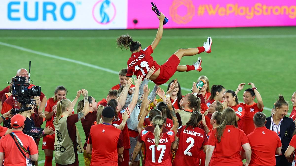 Poland's Natalia Padilla is thrown into the air by teammates after the match