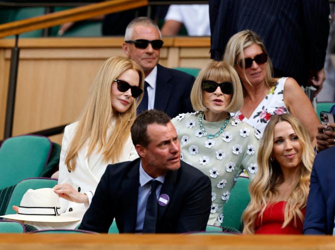 Editor-in-chief of Vogue Anna Wintour and actress Nicole Kidman in the royal box with former Wimbledon champion Lleyton Hewitt in the foreground