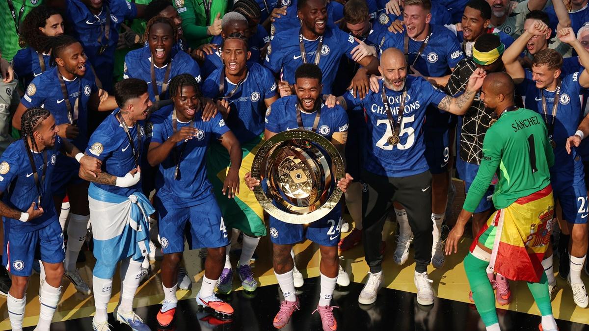 Chelsea players celebrate with the trophy after defeating Paris St Germain in the Club World Cup final at MetLife stadium, East Rutherford, New Jersey, on Sunday.