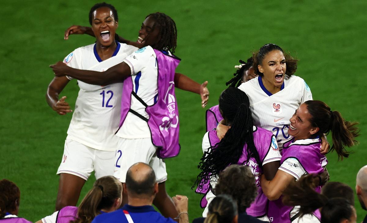 Delphine Cascarino celebrates scoring France's third goal.