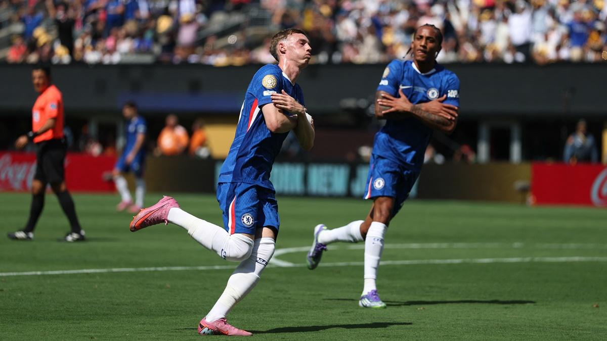 Cole Palmer celebrates scoring Chelsea's first goal with Joao Pedro.
