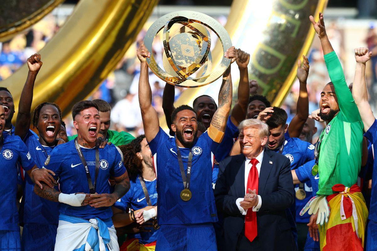 Chelsea's captain Reece James lifts the trophy as he celebrates with teammates after winning the FIFA Club World Cup as US President Donald Trump looks on