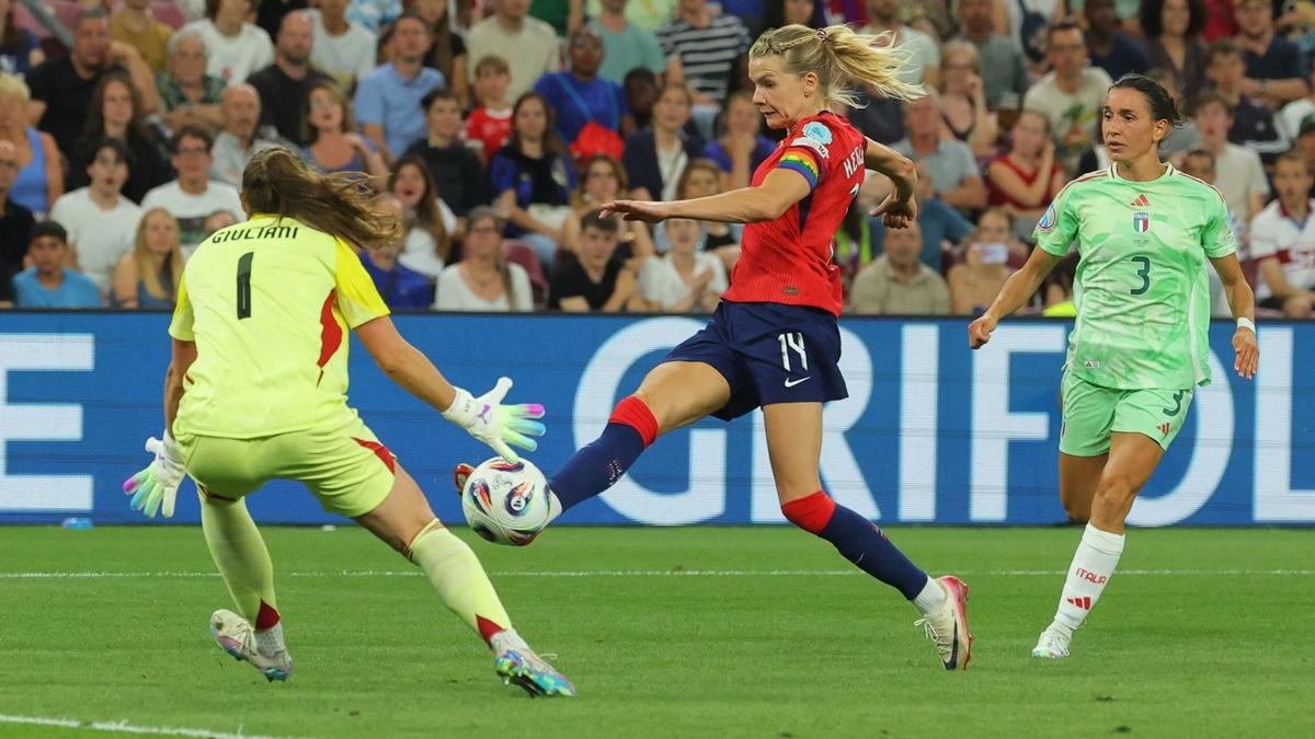 Ada Hegerberg scores Norway's first goal past Italy's goalkeeper Laura Giuliani.