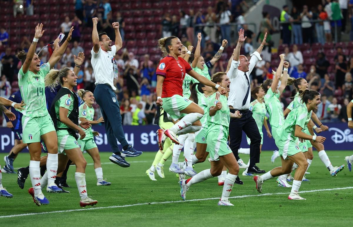 Italy's players celebrate after the final whistle.
