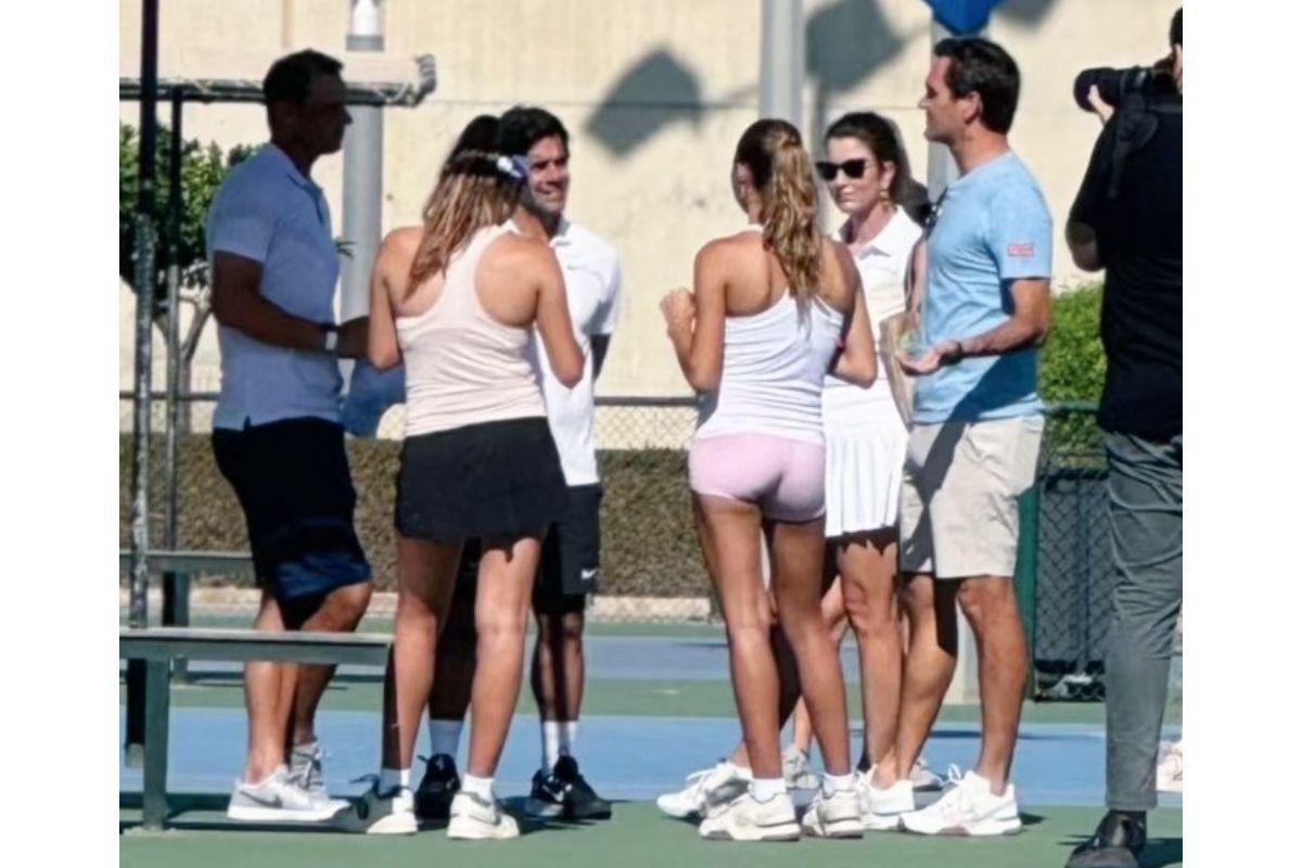 Rafael Nadal with Roger and Mirka Federer speaking with students from the Academy